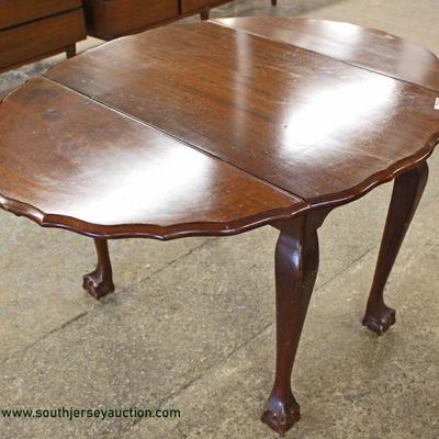 SOLID Mahogany Ball and Claw Drop Side Scalloped Edge Table â€“ auction estimate $100-$300