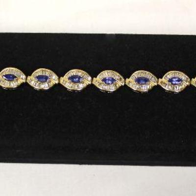  FANCY 14 Karat Yellow Gold with 2.9 Carats of Baguette Diamonds and 3.81 Carat of Marquise Tanzanite Ladies Bracelet with Appraisal of...