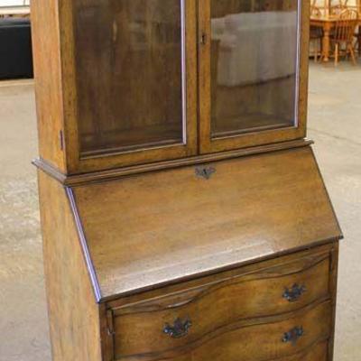 One of Several Mahogany Ball and Claw Serpentine Front Secretary with Bookcase Top â€“ auction estimate $100-$300