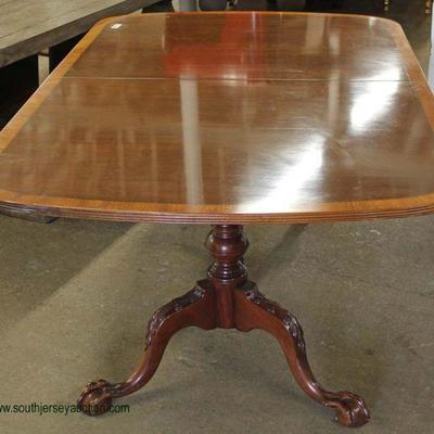 Mahogany Ball and Claw Banded Dining Room Table with 3 Leaves – auction estimate $100-$400 