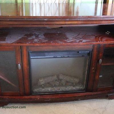  Mahogany Finish Fireplace TV Stand – auction estimate $100-$200 