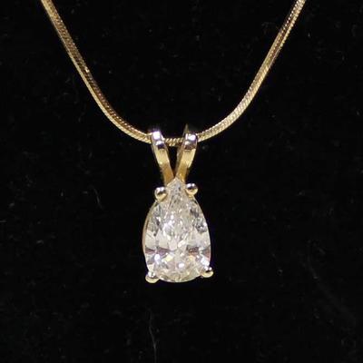 STUNNING 14 Karat Yellow Gold Necklace with 1 plus Carat Pear Shape Diamond Solitaire Pendant on 14 Karat Gold Chain â€“ auction estimate...