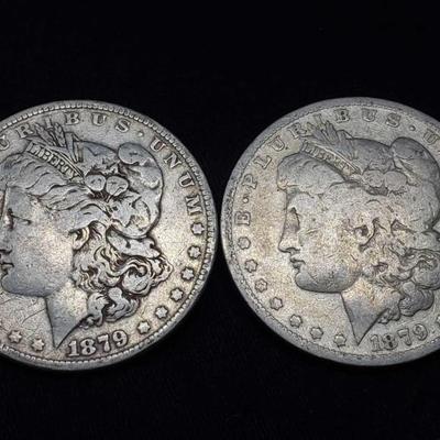 #415: Two 1879 Morgan Silver Dollars
Philadelphia and New Orleans Mint, 2.6g each J33