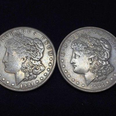 #434: Two 1921 Morgan Silver Dollars
Philadelphia Mint, each weigh 2.6g, J33