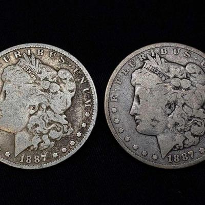 #420: Two 1887 Morgan Silver Dollars
New Orleans and Philadelphia Mint. 2.6g each J33