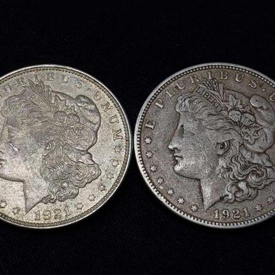 #428: Two 1921 Morgan Silver Dollars
Philadelphia Mint, each weigh 2.7g, J33