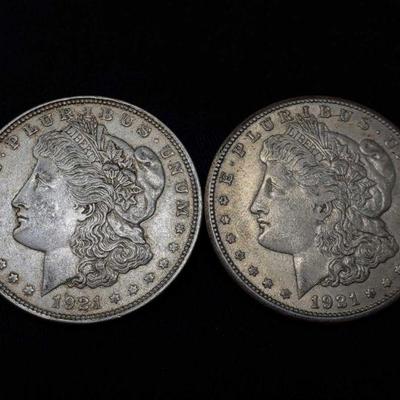 #432: Two 1921 Morgan Silver Dollars
Philadelphia Mint, each weigh 2.7g, J33