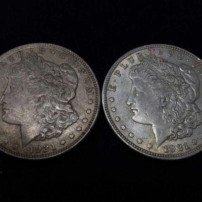#425: Two 1921 Morgan Silver Dollars
Philadelphia Mint, each weigh 2.7g, J33