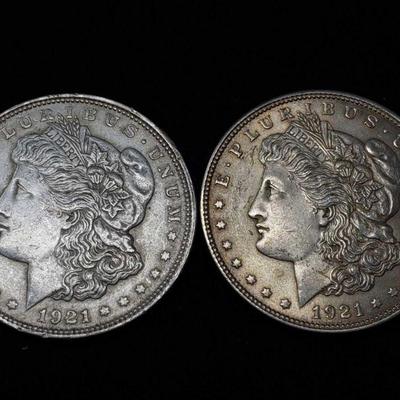 #427: Two 1921 Morgan Silver Dollars
Philadelphia Mint, each weigh 2.7g, J33