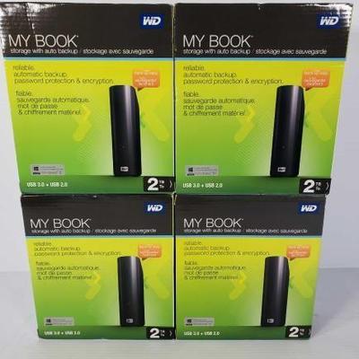 #805: 4 WD My Book 2TB Back Up Drives, all Appear to be New in Box
4 WD My Book 2TB Back Up Drives 