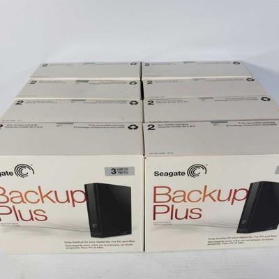 #808: 8 Seagate 3TB Back Up Drives, Alll Appear New in Box
8 Seagate 3TB Back Up Drives, All Appear New in Box 