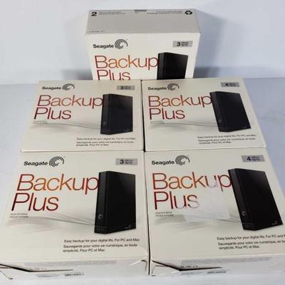 #807: 5 Seagate 3TB Back Up Drives, Alll Appear New in Box
5 Seagate 3TB Back Up Drives, All Appear New in Box 