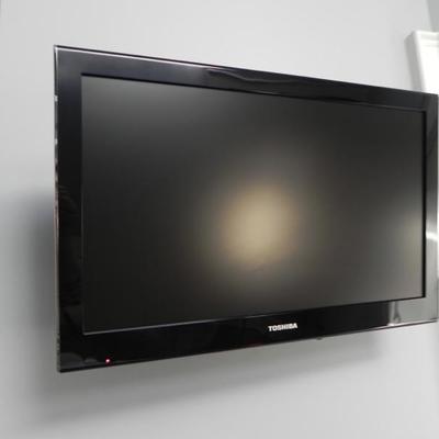 1 of 10 24" Toshiba TV's with mounting brackets and built in DVD players.
