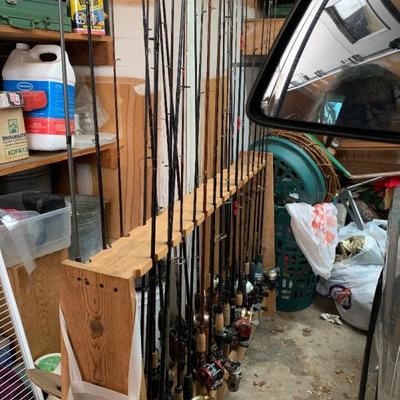 over 4 dozen rod and reels 