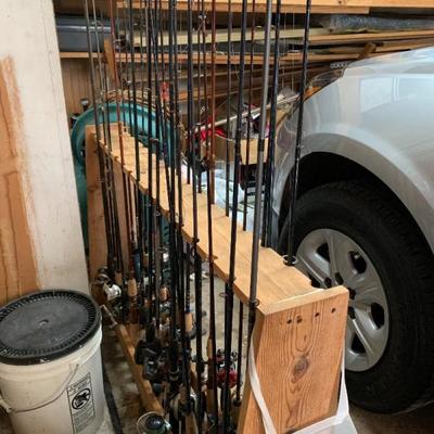 over 4 dozen rod and reels
