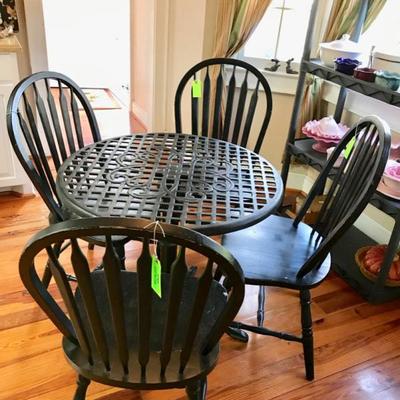 Chair $25
4 available
Metal table $75