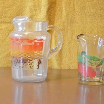 Two tea pitchers - glass - cute design!