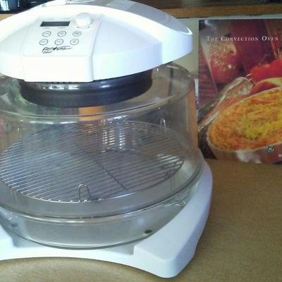 Convection oven with cookbook