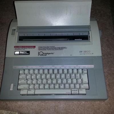 Electric typewriter with cover