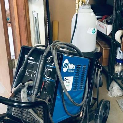 Welder, tank and cart. $300