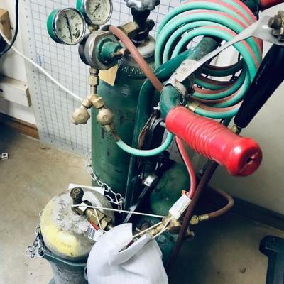 Torch, tanks (one is oxygen) and cart. $175.