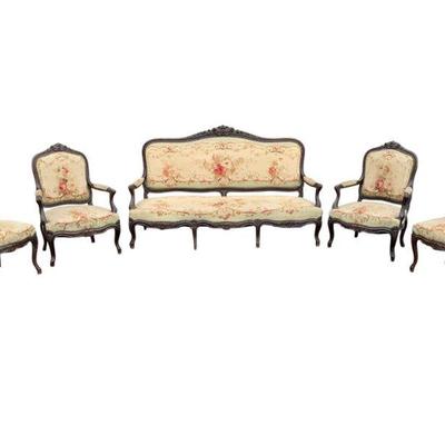 Rare find, Antique French salon set, with petite point tapestry upholstery. Five piece collection includes Sofa, 2 Arm Chairs, 2 Armless...