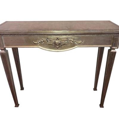 Italian style consul with Silver leaf finish. Beautiful decorative floral design and the front with accent carving. 