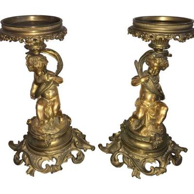 Fantastic pair of Italian bronze or Nate cherub candleholders. Great piece to use with a candle, with an insert for floral arrangements,...