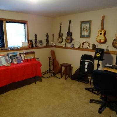 collection of toy roy rogers guitars. guitar stands, ,music books ..... 
