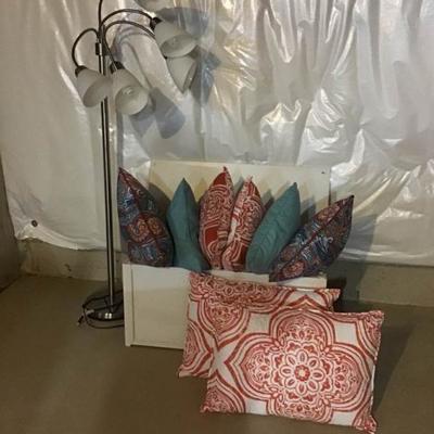 Lamp, Wood Box, and Decorative Pillows