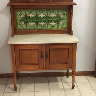 1870-1880 English wash stand, marble top and colored tiles on splash board
