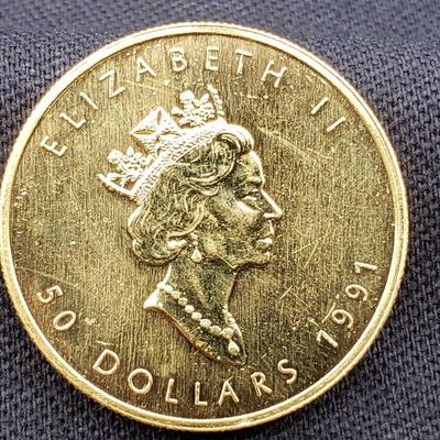 #13: 1991 $50 Maple Leaf 1oz. Fine Gold Coin
1991 $50 Maple Leaf 1oz. Fine Gold Coin