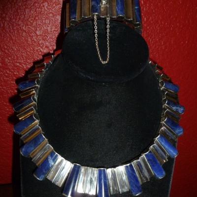  Cleopatra style Mexican lapis lazuli demi parure. It is made of almost pure silver (970) by Monteros The two pieces weigh nearly10 ounces. 