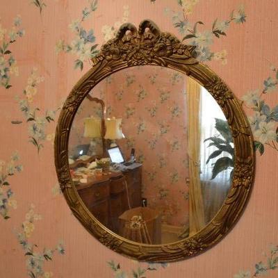 Ornate round mirror