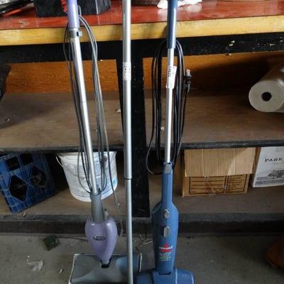 Lot with a bissel feather weight vacuum, shark ste ...