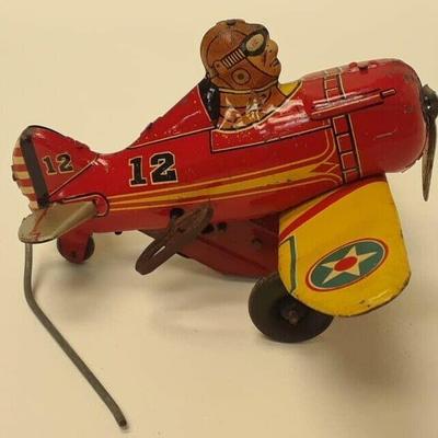 VINTAGE WW11 TIN TOY WIND-UP BOMBER PLANE WITH #12 ART 1950'S 6 INCHES RR5031 https://www.ebay.com/itm/113712112186
