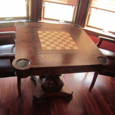 GAME TABLE WITH PAIR OF LEATHER ARM CHAIR SEATING