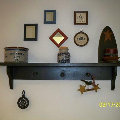 Painted shelf; Decor items.