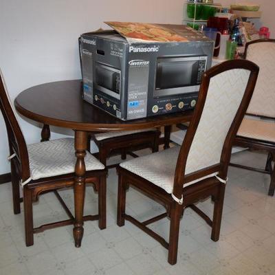 Table, Chairs, & Microwave Oven