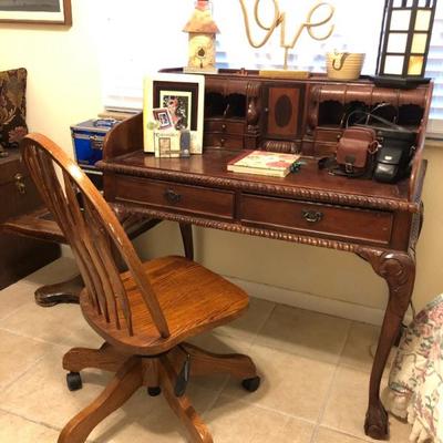 Wooden desk and rolling office chair