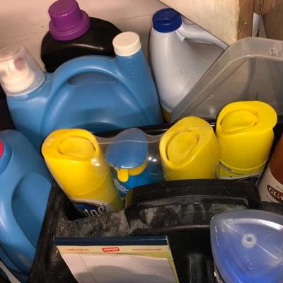 Large amount of cleaning supplies, and several new full bottles