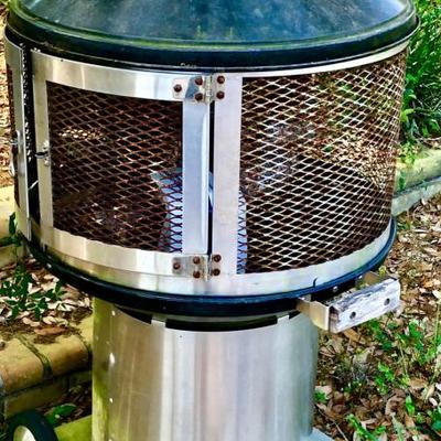 Outdoor wood burning grill