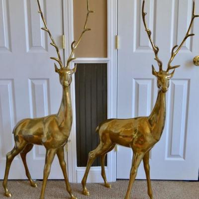 Brass stags, each just over 4' tall
