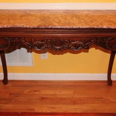 Hand carved marble top table
Price: $200
