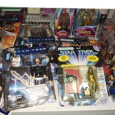 #1053: 35 Star Trek Action Figures, 13 in Original Playmates Packaging
All open action Figures are in Acrylic cases