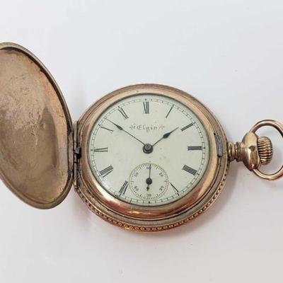 #551: 10k Gold Elgin Pocket Watch
Tested 10k, not maked, Marked 221562 and 7430136 Weighs approx 40.5g