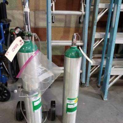 #1152: 2 Victor Medical Oxygen Tanks, 1 Stand with Wheels
2 Victor Medical Oxygen Tanks, 1 Stand with Wheels