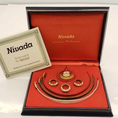 #704: Nivada Swiss Watch In Box with Interchangeable Bands and Pendants
Nivada Swiss Watch In Box with Interchangeable Bands and Pendants
