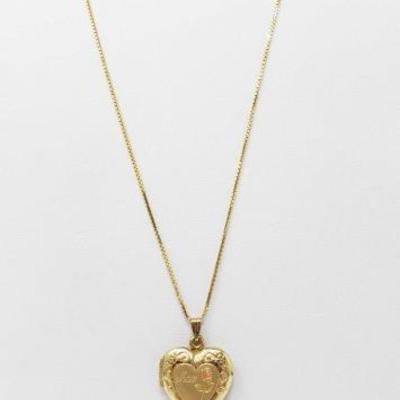 #545: 14k Gold Chain with 1/20 10k Gold Filled Locket
Chain measures approx 24