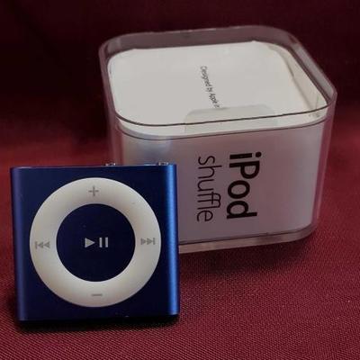 #754: Blue 2gb iPod Shuffle with Headphones and USB Cable 4th Gen
Blue 2gb iPod Shuffle with Headphones and USB Cable 4th Gen
